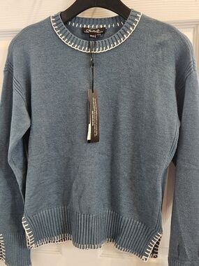 Charlies Blue Sweater with White Whipstitch Trim